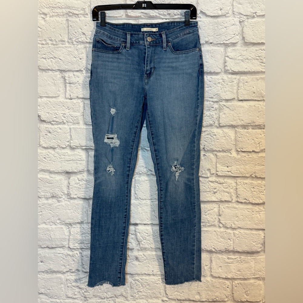 Levi's 711 Skinny Jeans in Classic Denim distressed size 28